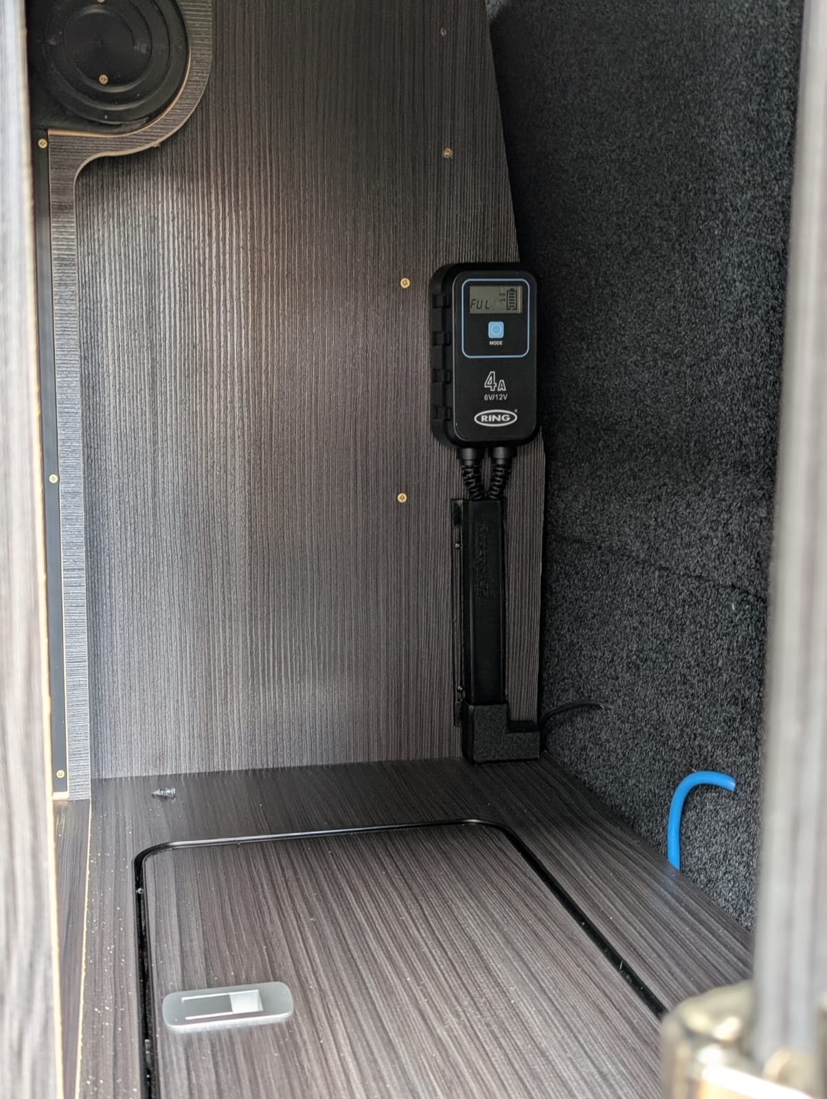 Highland Edition battery charger and storage compartment